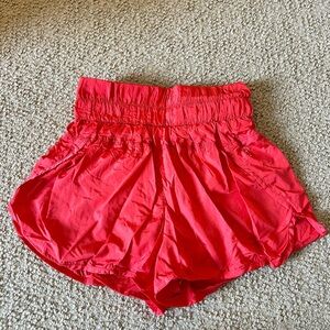 free people the way home shorts in red/orange